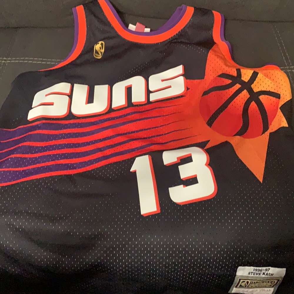 This is a Mitchell and ness throwback Steve Nash Phoenix suns jersey